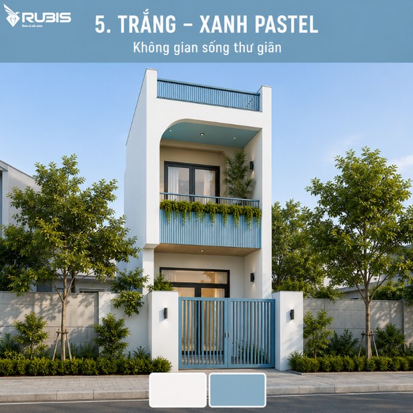 Mẫu nhà ống 2 tầng hiện đại phối màu trắng xanh pastel với mặt tiền thanh lịch, tạo cảm giác tươi sáng và hiện đại.